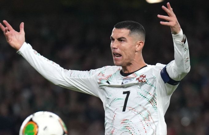 Cristiano Ronaldo with an annoyed expression, complaining about a decision that was made