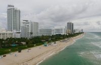 One of Miami’s beachfronts in front of the high-rise buildings on a very cloudy day