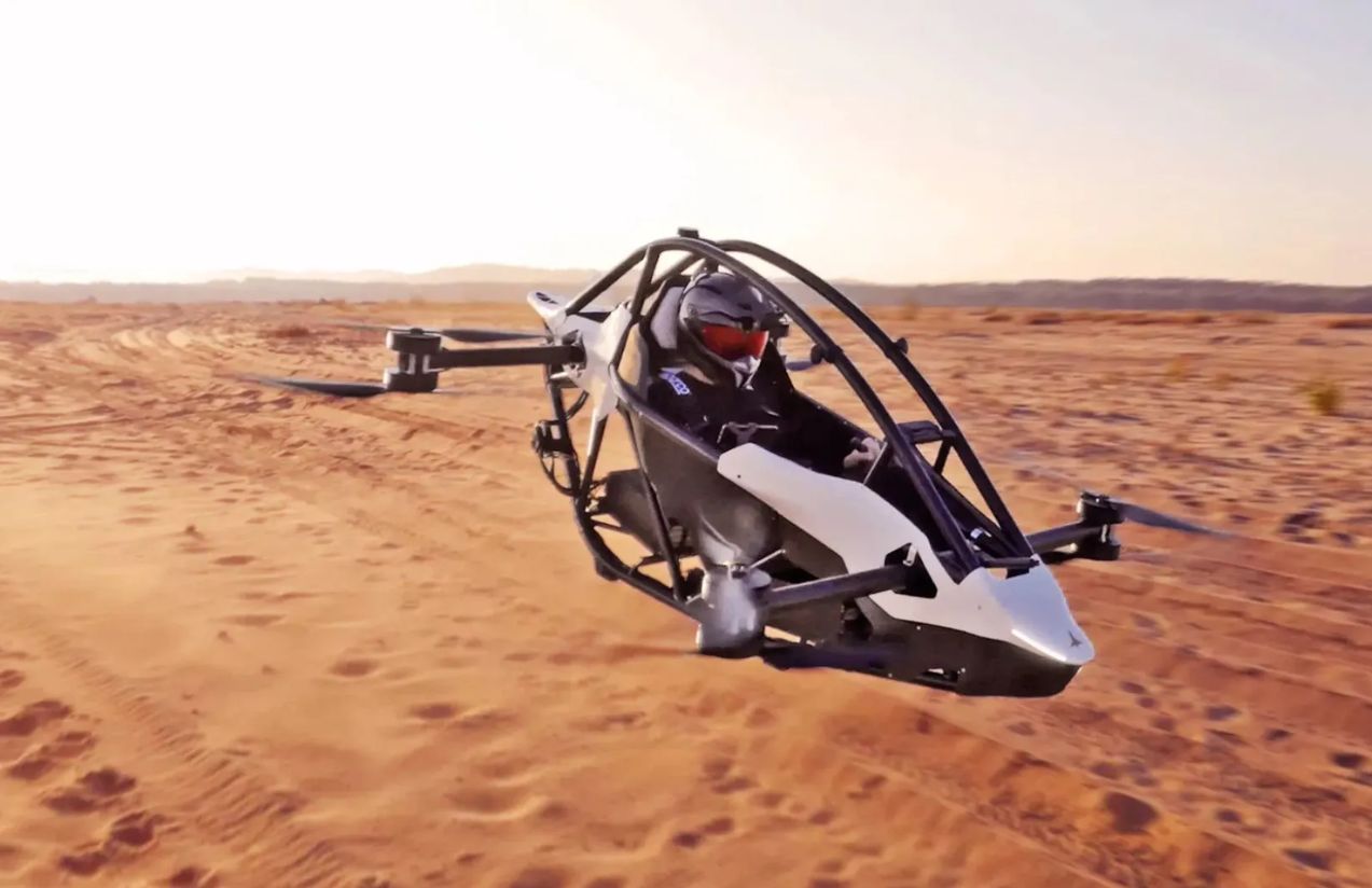 the new personal helicopter flying over what appears to be a desert