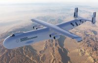 The gigantic gray airplane flying over the American sky