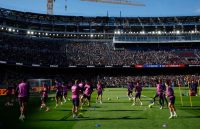The Spotify Camp Nou filled with thousands of people as Barcelona’s players train on the field
