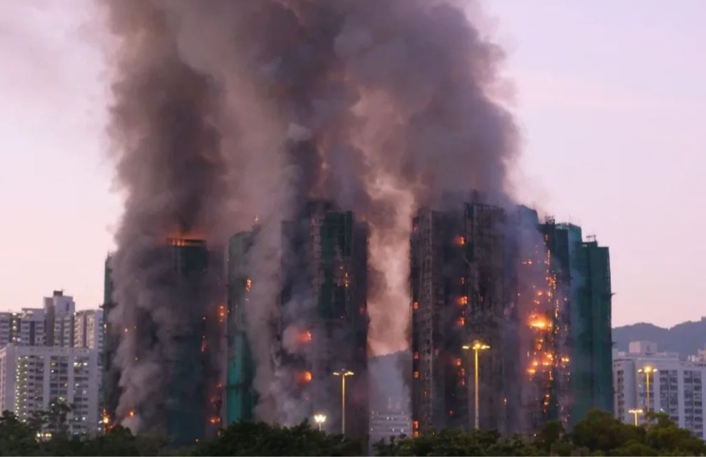 Four buildings in Hong Kong being consumed by flames after the sudden fire