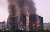 Four buildings in Hong Kong being consumed by flames after the sudden fire