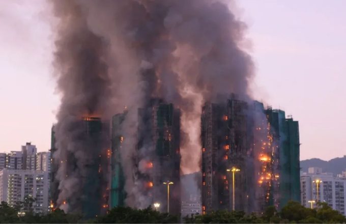 Four buildings in Hong Kong being consumed by flames after the sudden fire