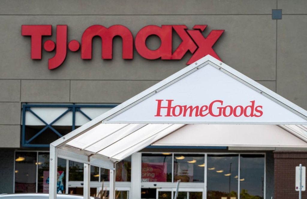One of the TJ Maxx stores seen from the front, featuring its signature beige and red colors