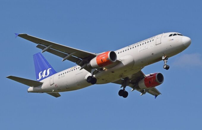 A plane Airbus flying across the skies