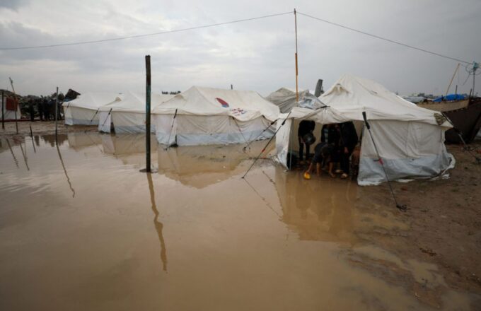 Several shops submerged by the residual floodwater left behind by the rains in Gaza