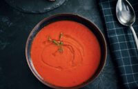 The famous American tomato soup served in a bowl on a table