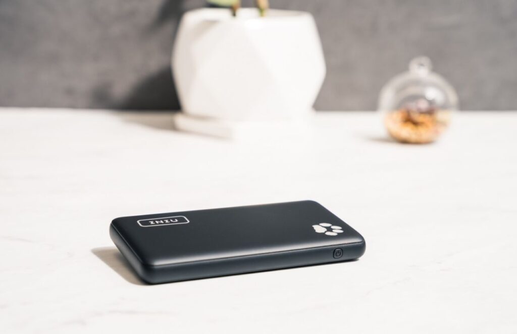 INIU battery sold on Amazon recalled after fires and injuries A portable battery placed on a table while its cable is connected