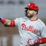 The great baseball player celebrating with the fans after hitting a home run