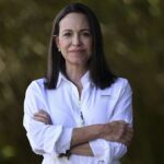 The Venezuelan politician posing for a photo with her arms crossed
