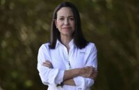 The Venezuelan politician posing for a photo with her arms crossed