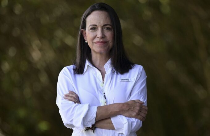 The Venezuelan politician posing for a photo with her arms crossed