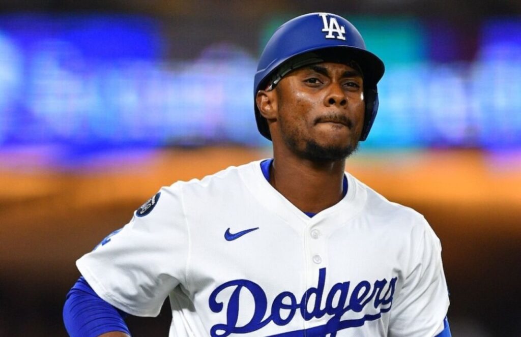 Ruiz wearing the Dodgers uniform in the middle of a game as he comes in as a substitute