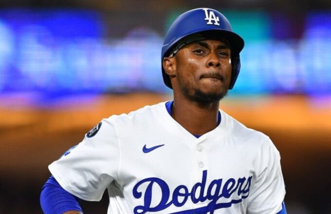 Ruiz wearing the Dodgers uniform in the middle of a game as he comes in as a substitute