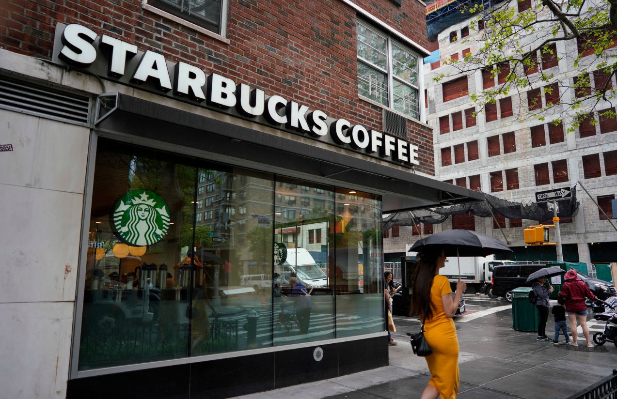 A Starbucks store on a street corner in New York City