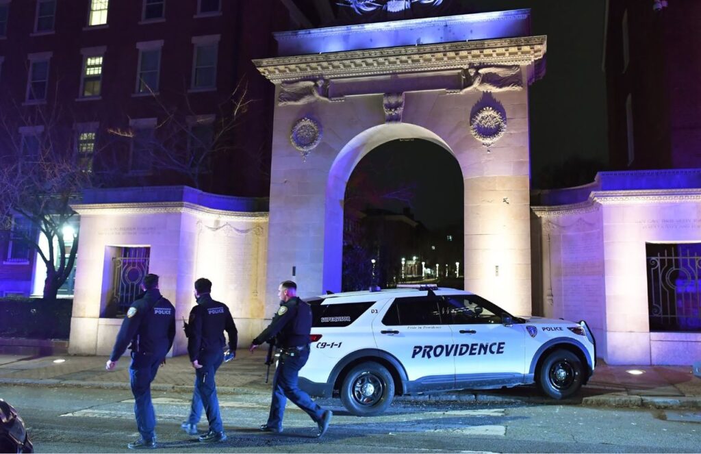 Suspect in custody after shooting sparks alarm at Brown University The entrance of Brown University with many officers and police cars at its gates