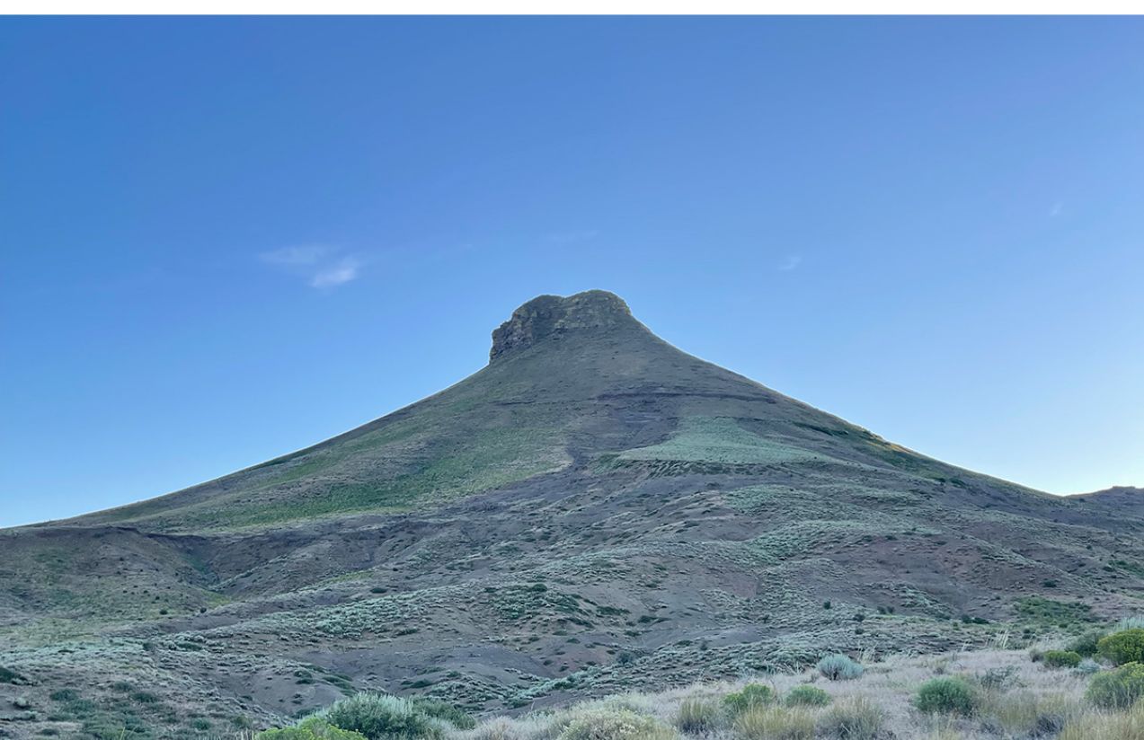 A panorama with a very tall mountain where the lithium deposit is located