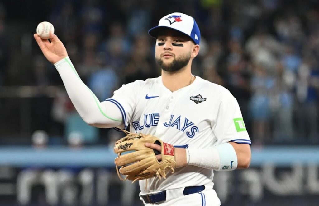Bo Bichette arrives in New York as the biggest signing of the season Bichette about to throw the ball after catching it in the middle of a game