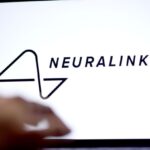 A computer with the Neuralink logo and name