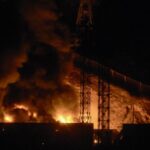 A Venezuelan military base engulfed in smoke and explosions following U.S. attacks