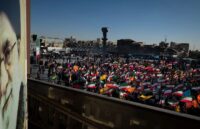 A crowd of Iranians taking to the streets of their country in protest over the internet ban