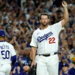 Clayton raising his cap after the victory during his retirement tribute in the middle of a game with the Dodgers