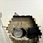 Several layers of concrete with a hole in the middle made by an industrial dril