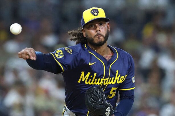 A baseball leaving pitcher Peralta’s hand in the middle of a game