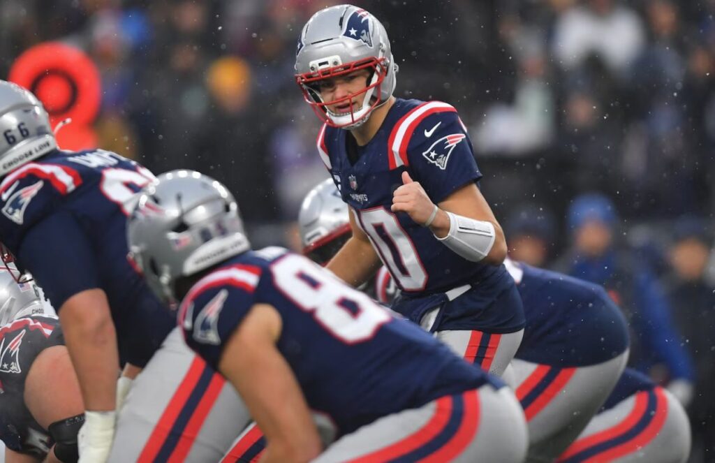 The Patriots’ quarterback giving instructions before the play begins