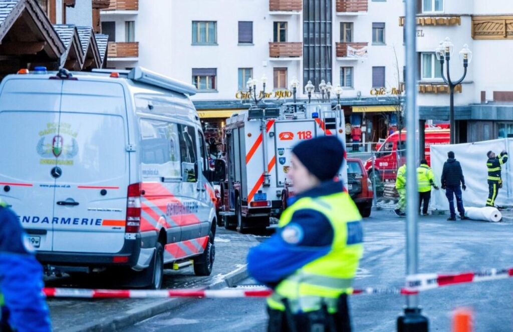 Tragedy in the Alps: Fire at swiss ski bar leaves dozens dead and injured Police officers and emergency responders outside the bar where the tragedy occurred in Switzerland