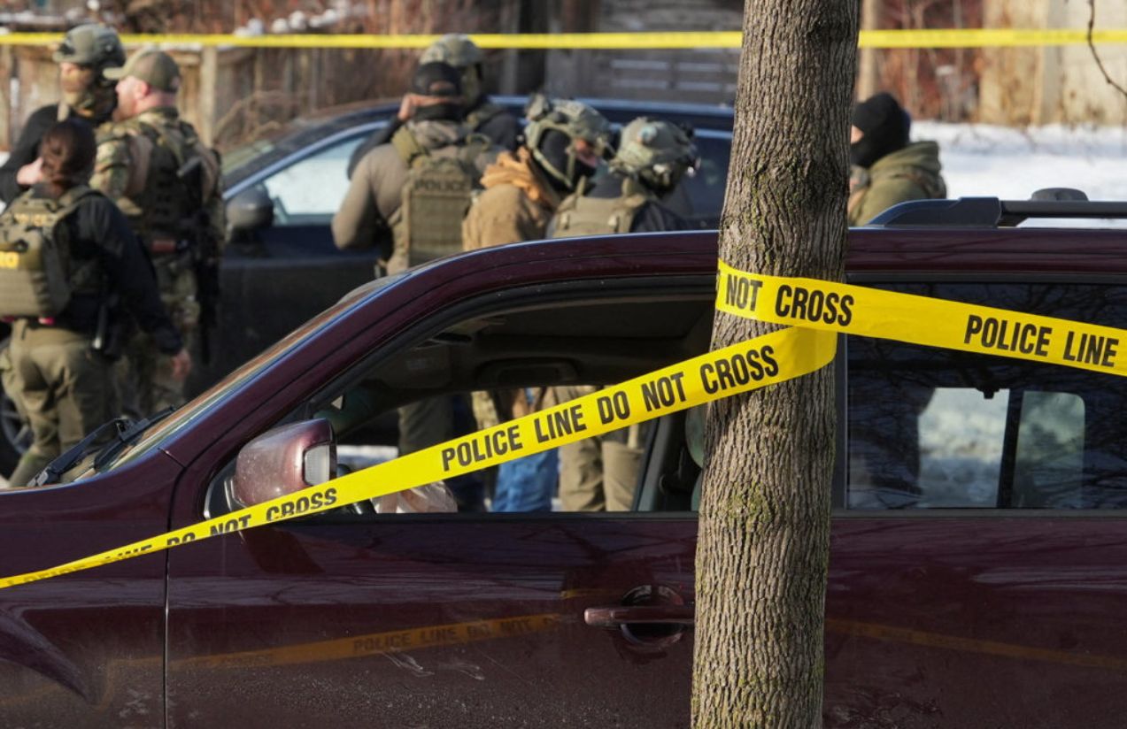 The deceased woman’s car crashed into a public streetlight pole, surrounded by several “do not cross” police tape lines