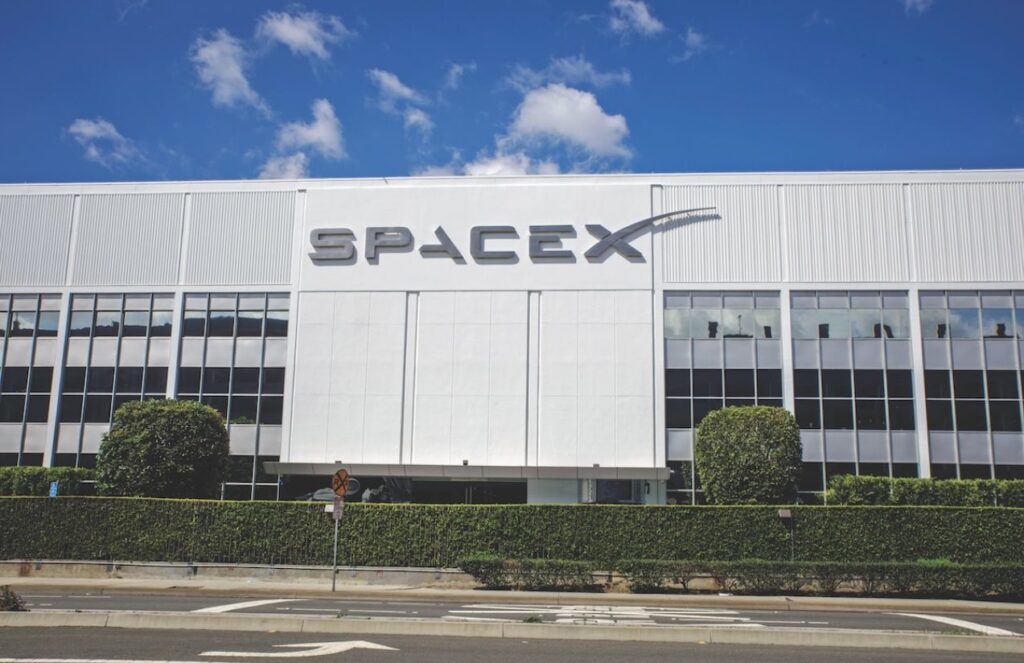 The SpaceX offices seen from the outside, featuring their striking white color and very large windows