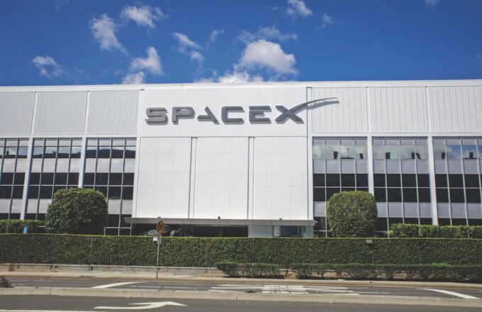 The SpaceX offices seen from the outside, featuring their striking white color and very large windows