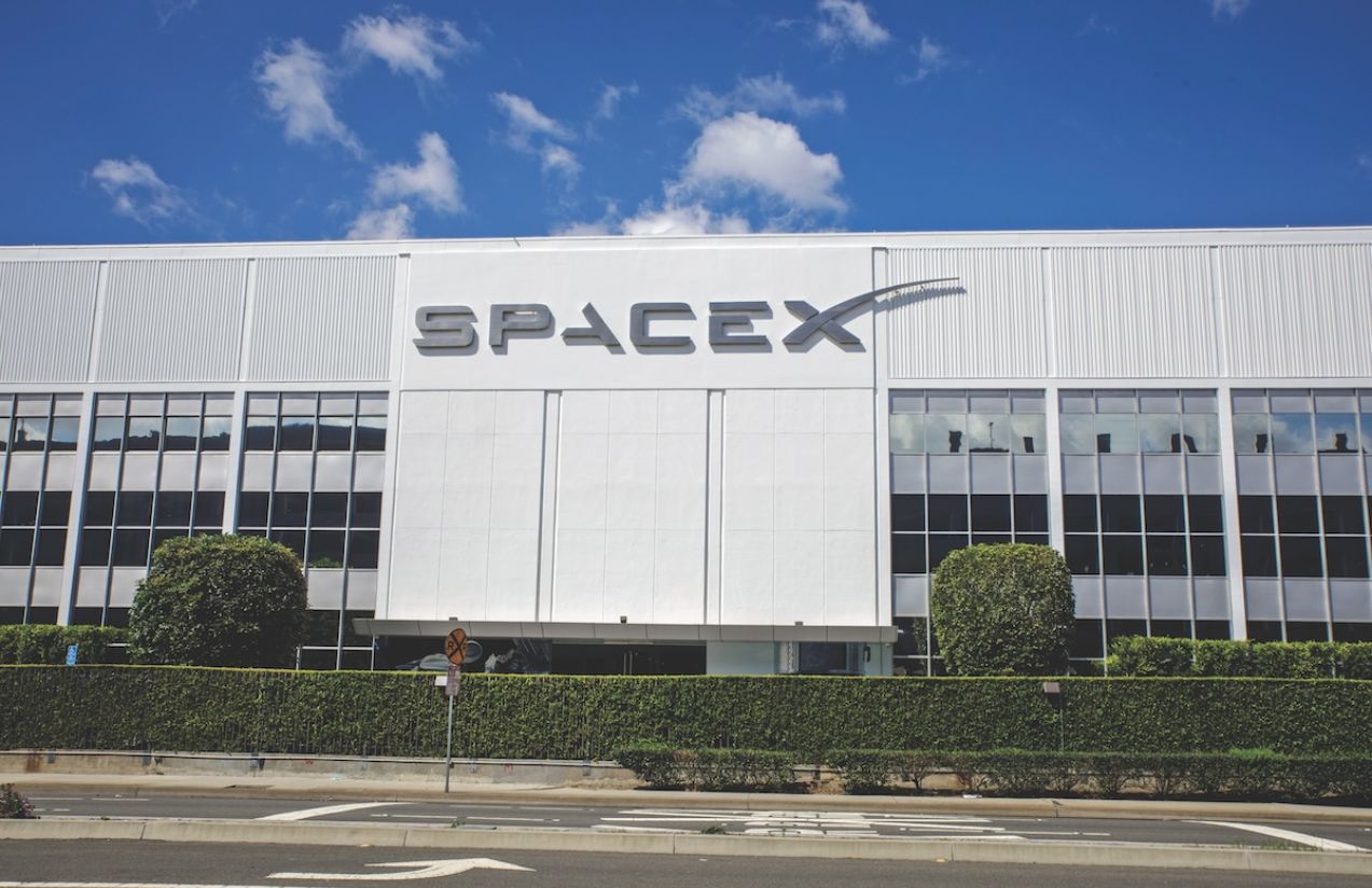 The SpaceX offices seen from the outside, featuring their striking white color and very large windows