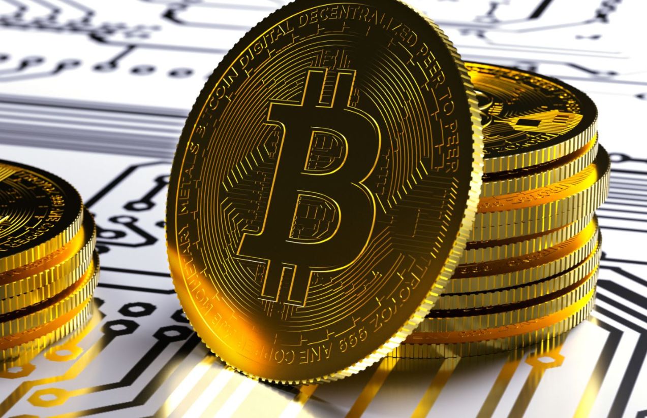 A physical Bitcoin coin with its well-known logo printed on it