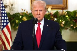 Donald Trump speaking with his supporters and close associates inside the White House