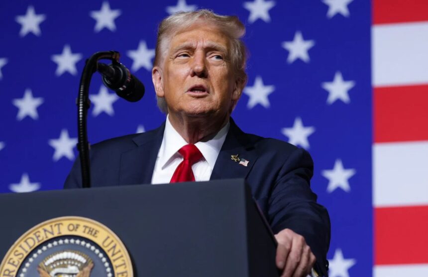 Donald Trump speaking to the crowd during an event