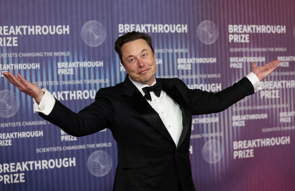 Elon Musk prepares a historic merger between SpaceX and xAI that could reshape technology Elon on a red carpet posing for cameras while wearing an elegant suit