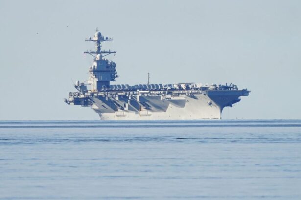 A United States aircraft carrier in international waters awaiting orders to attack