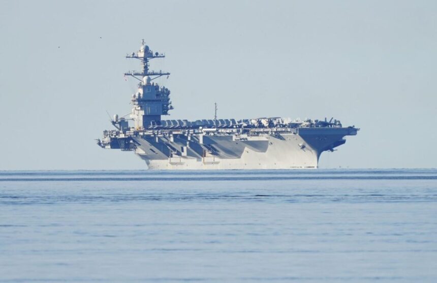 A United States aircraft carrier in international waters awaiting orders to attack