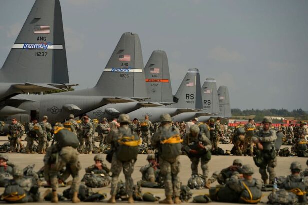 Hundreds of soldiers waiting to board multiple aircraft to depart for their new destination