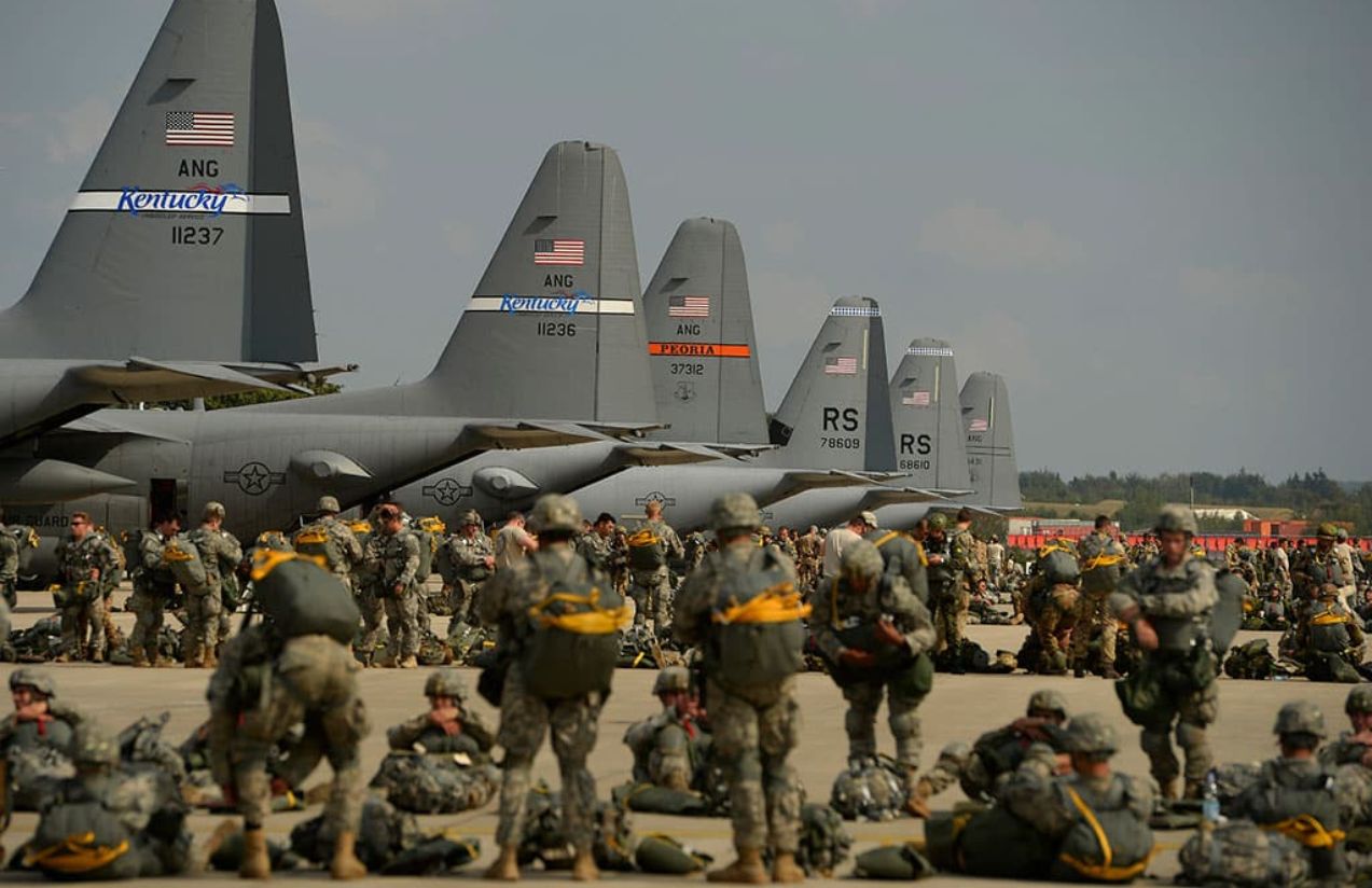 Hundreds of soldiers waiting to board multiple aircraft to depart for their new destination
