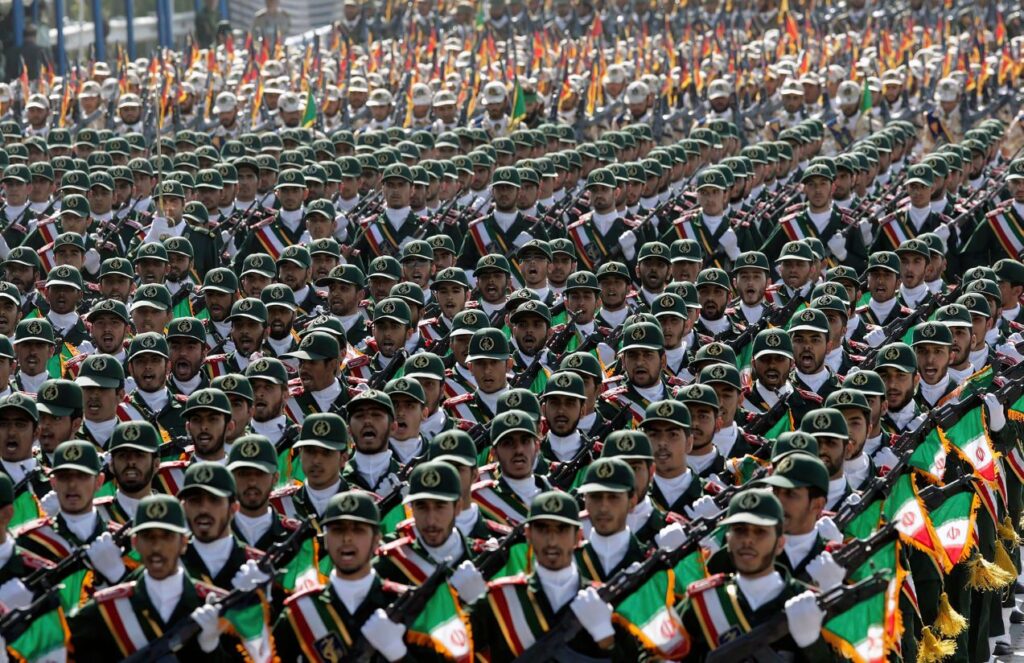 Iran raises tensions and declares European Union armies “terrorist” groups A section of the Iranian army standing in formation with their weapons while marching