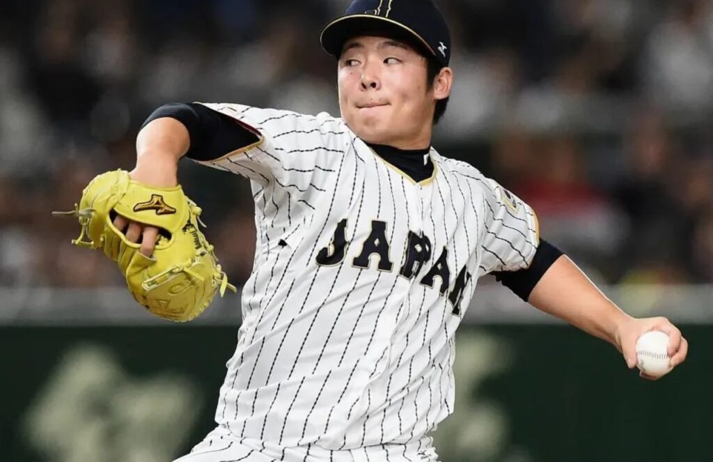 Japan suffers major blow: Yuki Matsui ruled out of the 2026 World Baseball Classic The Japanese left-handed pitcher about to throw a ball while wearing his national team uniform