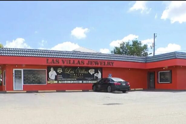 A photo of the Las Villas Jewelry store, featuring its striking red color and a black sign with gold lettering