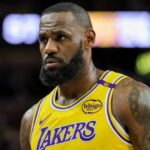 LeBron James staring intently at the crowd while focused during a game