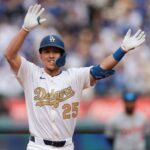 Edman performing the Dodgers’ typical celebration after hitting a base hit