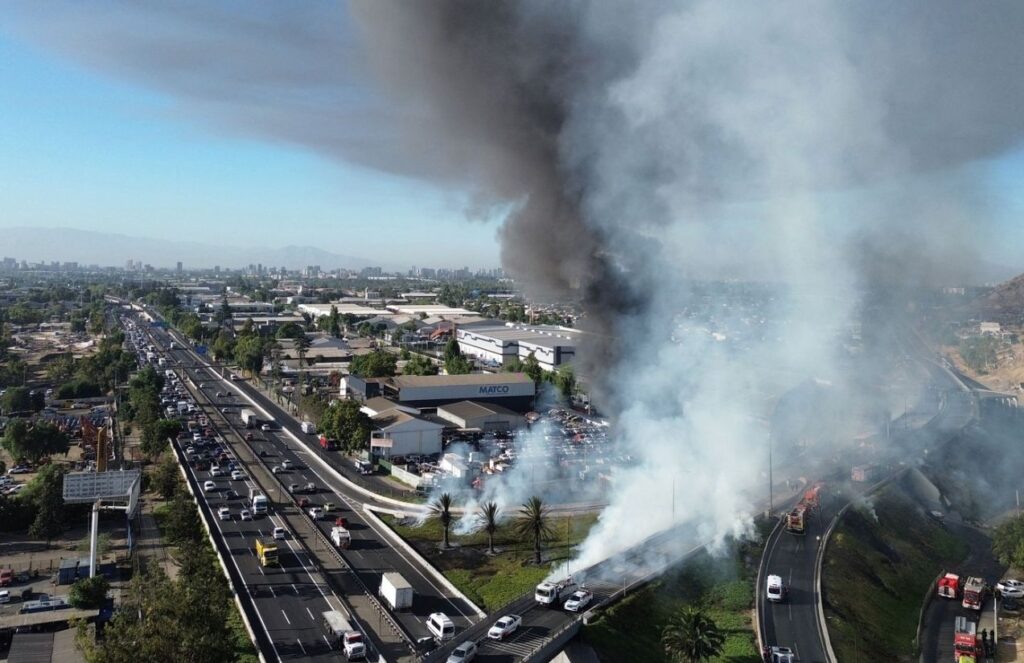 Several cars emitting smoke after being set on fire following the death of “El Mencho.”