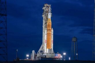 A rocket on the horizon preparing to launch into outer space